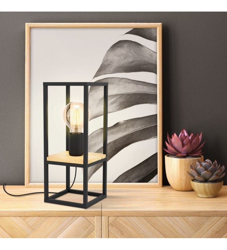 Nowoczesna lampa stołowa Libertad z czarnych profili z drewnianym panelem na komodę